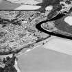 Oblique aerial view centred on the town of Coldstream with road bridge adjacent, taken from the SSW.
