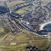 Oblique aerial view centred on the harbour, taken from the ENE.