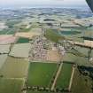 General oblique aerial view looking across the town of Chirnside, towards the North Sea coastline in the distance, taken from the WSW.