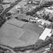 Galashiels, oblique aerial view, taken from the E, centred on the football and rugby grounds.