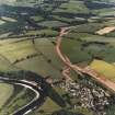 Oblique aerial view, taken from the NW, showing the Newstead By-pass under construction.