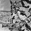 Oblique aerial view from the NW centred on the remains of the Abbey.