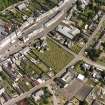 Oblique aerial view centred on St. Mary's church, taken from the W.