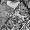 Oblique aerial view centred on abbey from W.