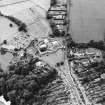 Oblique aerial view centred on the jail, burial ground and The Hermitage, taken from the NE.