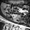 Oblique aerial view centred on walled garden from N.