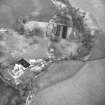 Oblique aerial view centred on country house from WSW.