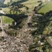 General oblique aerial view of Jedburgh, the jail, burial ground and abbey, taken from the NNE.