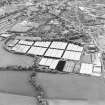 Oblique aerial view centred on the bonded stores of the Carsebridge Distillery, Alloa, taken from the E