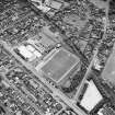 Oblique aerial view, centred on the football ground, taken from the SE