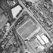 Oblique aerial view, centred on the football ground, taken from the NW