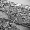 Oblique aerial view of southern Alloa and industrial units close to the River Forth, taken from the N