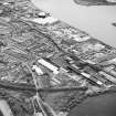 Oblique aerial view of southern Alloa and industrial units close to the River Forth, taken from the NNW