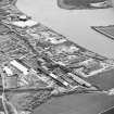Oblique aerial view of southern Alloa and industrial units close to the River Forth, taken from the NW