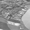 Oblique aerial view of southern Alloa and industrial units close to the River Forth, taken from the W