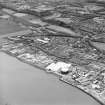 Oblique aerial view of southern Alloa and industrial units close to the River Forth, taken from the SSE