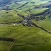 General oblique aerial view centred on the village, taken from the NE.