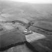Oblique aerial view centred on village from E.