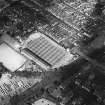 Oblique aerial view centred on the football stadium, taken from the SW.