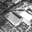 Oblique aerial view centred on the football stadium, taken from the NE.