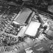 Oblique aerial view centred on the football stadium, taken from the NNW.