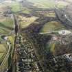 Oblique aerial view of the Falkirk Wheel, lock, and the remains of the Roman fort and Antonine Wall, taken from the E.