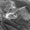 Oblique aerial view centred on the Falkirk Wheel with the remains of the works adjacent, taken from the NW.
