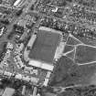 Oblique aerial view centred on the football ground, taken from the NE.