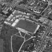 Oblique aerial view centred on the football ground, taken from the WNW.