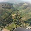 General oblique aerial view looking across Lochearnhead village and along Glen Ogle towards the Grampian mountains, taken from the SE.