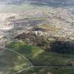 General oblique aerial view centred on the castle with the garden adjacent and Bridge of Allan in the background, taken from the SW.