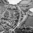Oblique aerial view centred on town house from N.