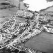 Oblique aerial view centred on town house from N.