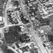 Oblique aerial view centred on town house from S.
