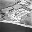 Oblique aerial view centred on chemical works from SW.