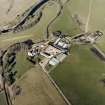Oblique aerial view centred on the famsteading, taken from the SW