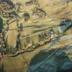 General oblique aerial view centred on the farmhouse and farmsteading with the remains of the scooped settlement adjacent, taken from the SW