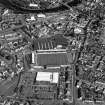 Oblique aerial view of Queen of the South F.C., Palmerston Park, taken from the W, centred on the football ground.