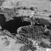 Oblique aerial view of Tongland Dam, taken from W, centered on dam.
