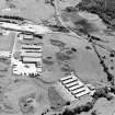 Oblique aerial view centred on Unit 2 of the explosves works and armament depot, showing the earthworks for burette houses and charge houses taken from the NW.
Also visible is Edingham Castle,  Edingham Industrial estate with Edingham farm poultry houses.
