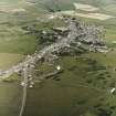 Oblique aerial view centred on the village, taken from the S.