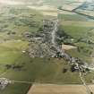 Oblique aerial view centred on the village, taken from the NNE.