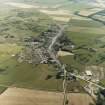 Oblique aerial view centred on the village, taken from the NNE.