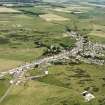 General oblique aerial view centred on the village, taken from the SE.