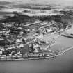 Oblique aerial view of Charlestown including Harbour and Limekilns