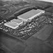 Oblique aerial view of Halbeath, Dunfermline, centred on the Hyundai factory, taken from the SW.