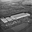 Oblique aerial view of Halbeath, Dunfermline, centred on the Hyundai factory, taken from the SSW.