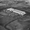 Oblique aerial view of Halbeath, Dunfermline, centred on the Hyundai factory, taken from the SSE.