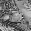 Oblique aerial view of Cowdenbeath centred on the Central Park football ground, taken from the ENE.