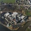 Oblique aerial view centred on the paper mill, taken from the ESE.